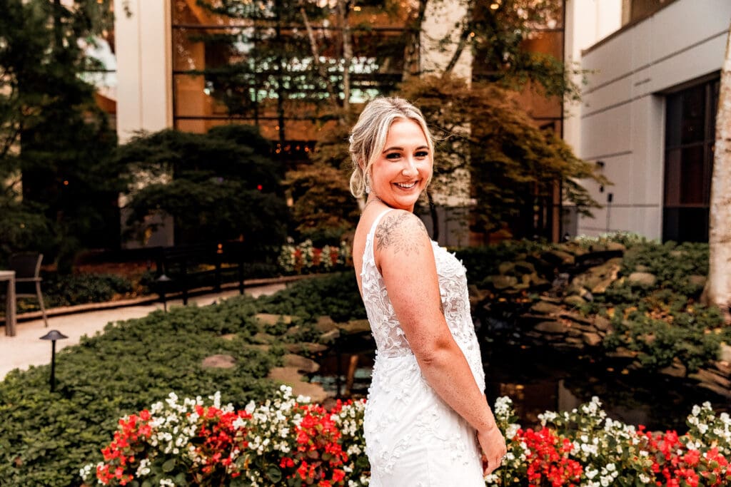 Pittsburgh bride swaying and smiling during wedding portraits