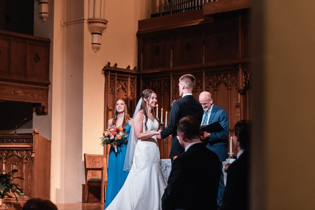 Bride and groom exchange heartfelt vows during their church wedding ceremony