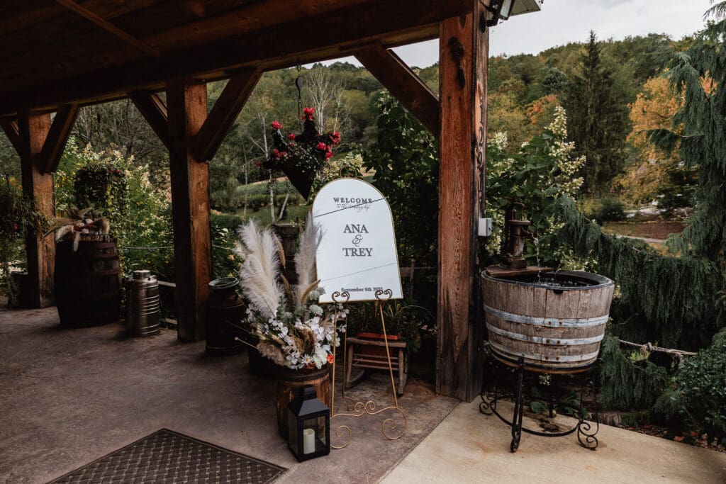 Welcome mirror decorated with fall and boho decor at Hinckston Run Farm ceremony