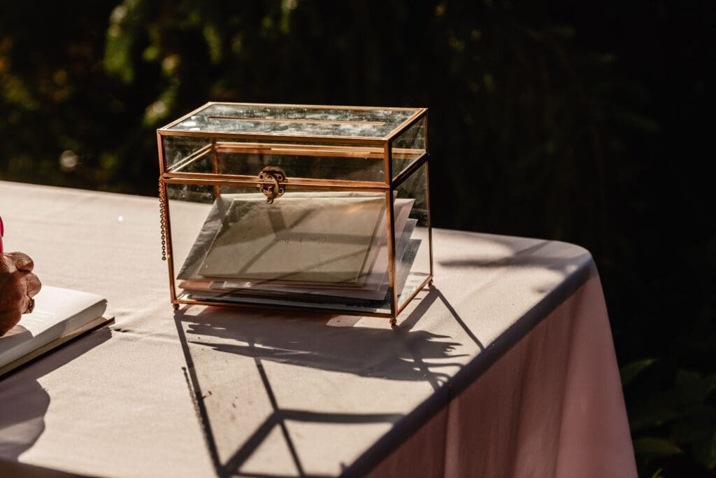 Clear glass card box for wedding gifts at a Pittsburgh Phipps Botanical Gardens wedding