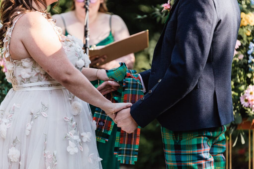 Traditional Scottish wedding ceremony takes place outdoors at National Aviary
