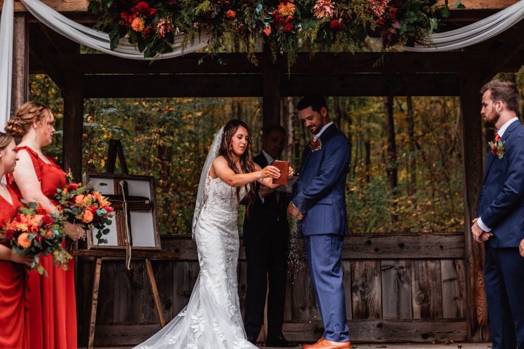 Bride dusts off vows during outdoor ceremony at Hinckston Run Farm