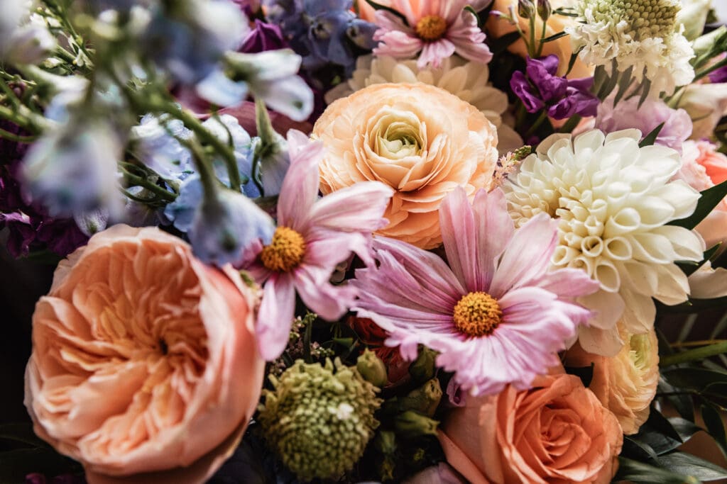 Close up of colorful bridal bouquet from Dormont Florist at Pittsburgh Airport Marriott wedding