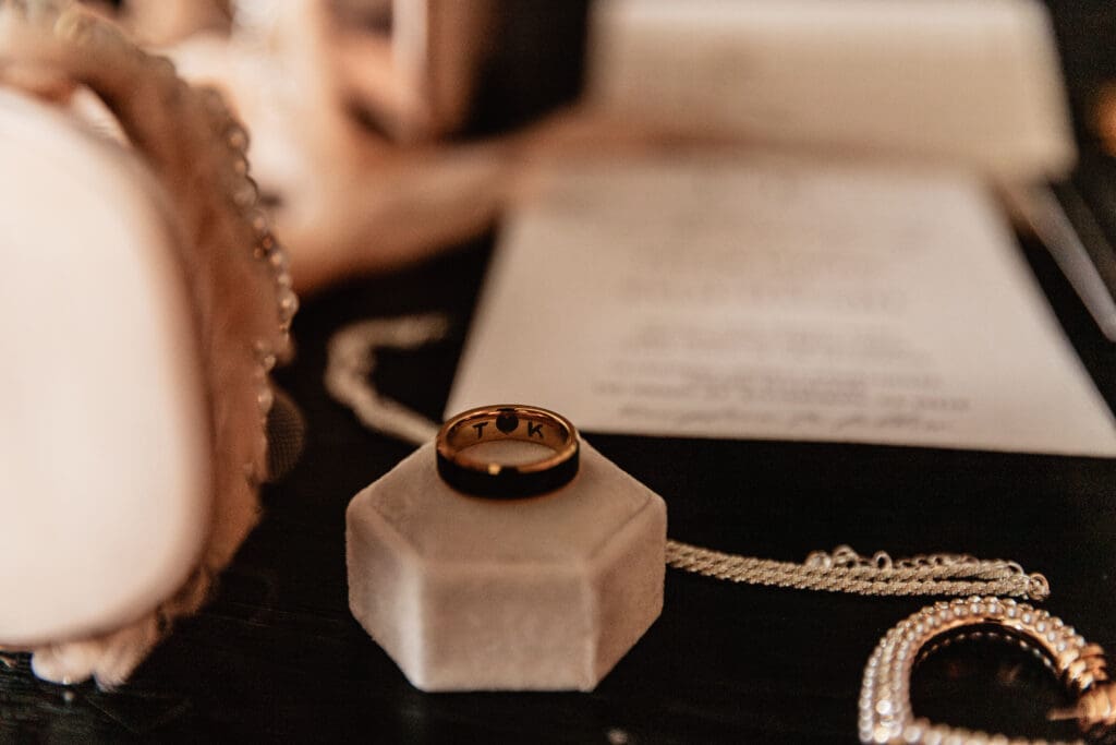 Close-up of an engraved men’s wedding ring from an Allegheny County Courthouse elopement