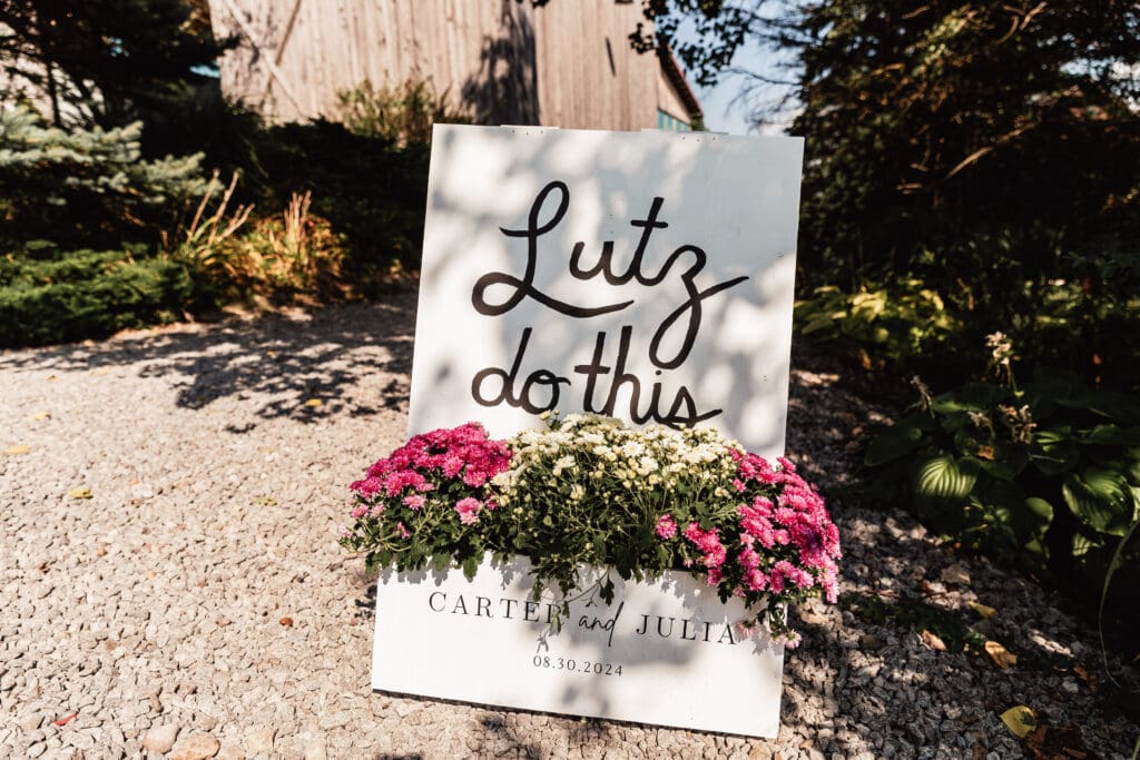 Floral welcome flower box sign displayed at Willowbrook wedding venue in Volant, PA