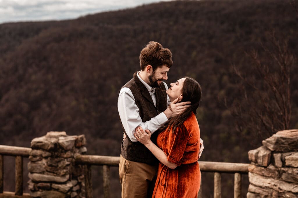 Engaged couple gazing at each other lovingly during their Coopers Rock State Park engagement session