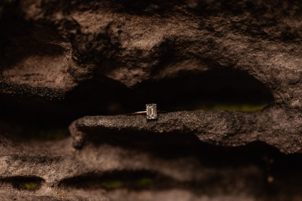 Engagement ring placed inside a natural rock formation at Coopers Rock State Park
