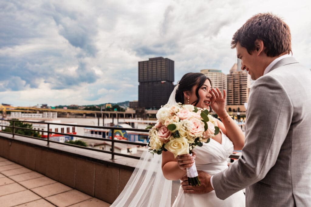 Bride and groom share an emotional first look at Sheraton Station Square