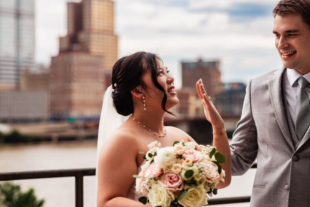 Wedding couple reacts emotionally during first look at Sheraton Station Square