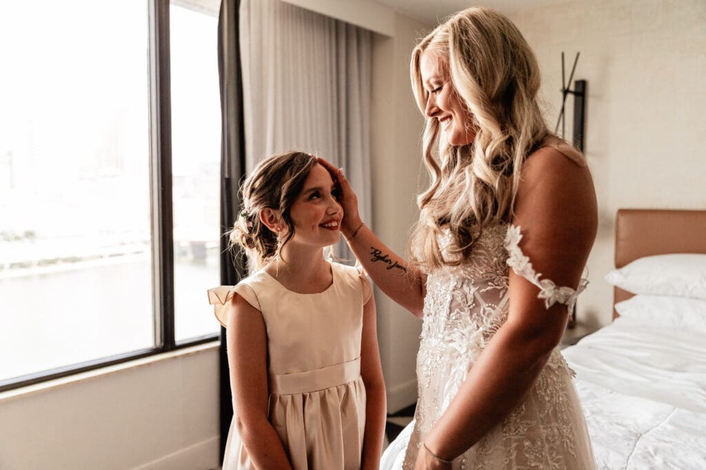 Bride smiles at her daughter during an intimate Allegheny County Courthouse wedding day