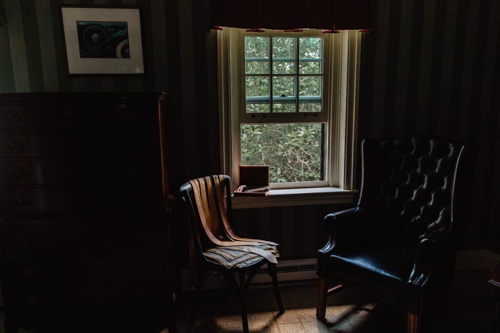 Antique chair with cigars and ties for wedding party at Succop Nature Park