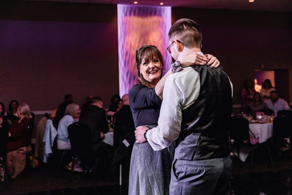 Groom dances with his mom during evening reception at The Fez