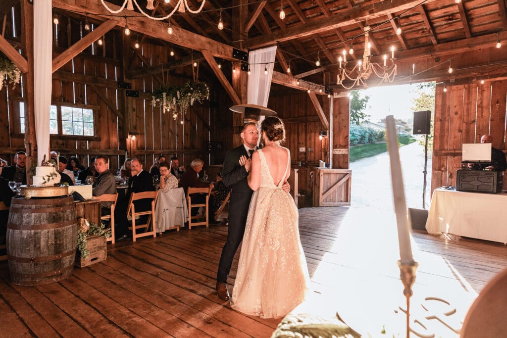 Wedding couple dancing together for first dance at Pinehall at Eisler Farm