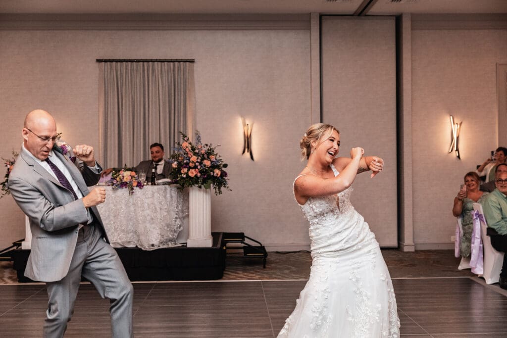 Pittsburgh bride and her dad laughing together during reception dance