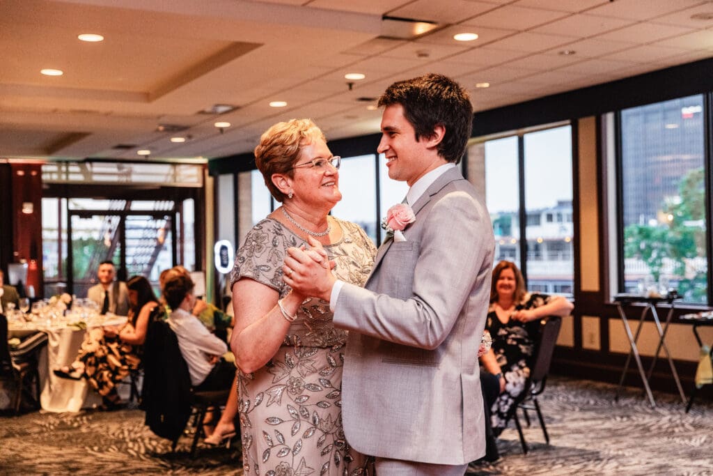 Tender mother-son dance during an elegant wedding reception at Sheraton Station Square