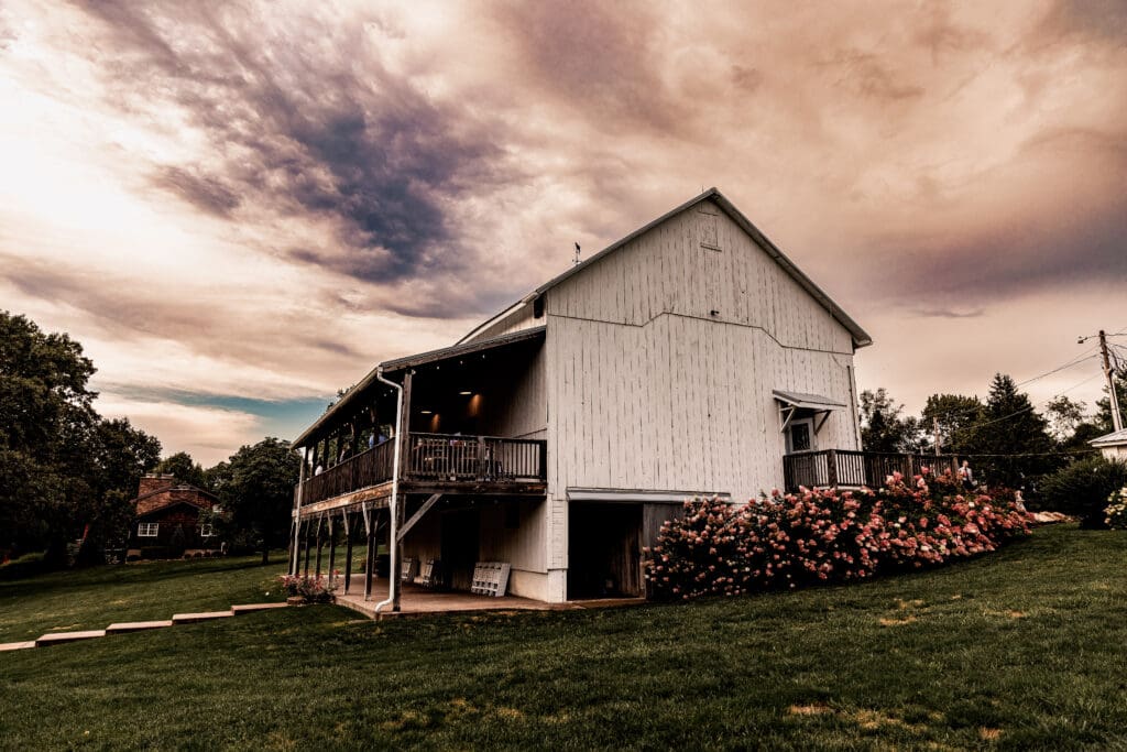 Sunset view of the reception barn at The Barn at Ever Thine wedding venue in Butler County, PA