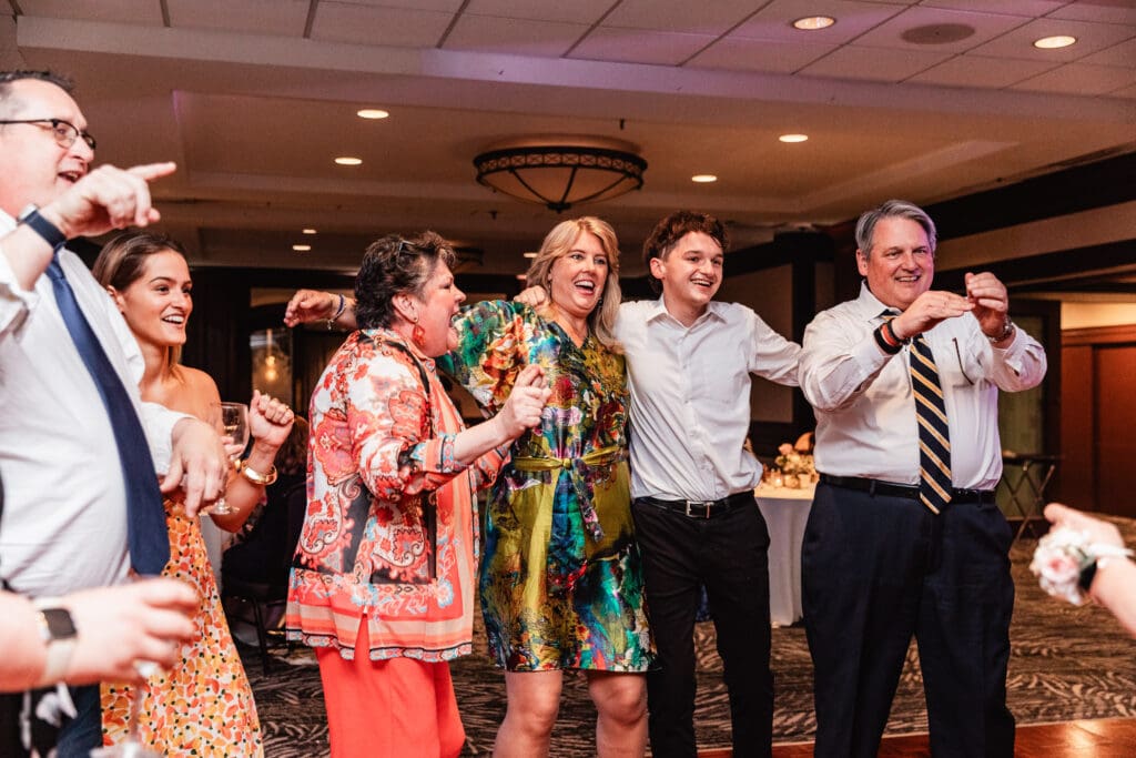 Guests enjoy a high-energy dance floor celebration during a Sheraton Station Square wedding reception
