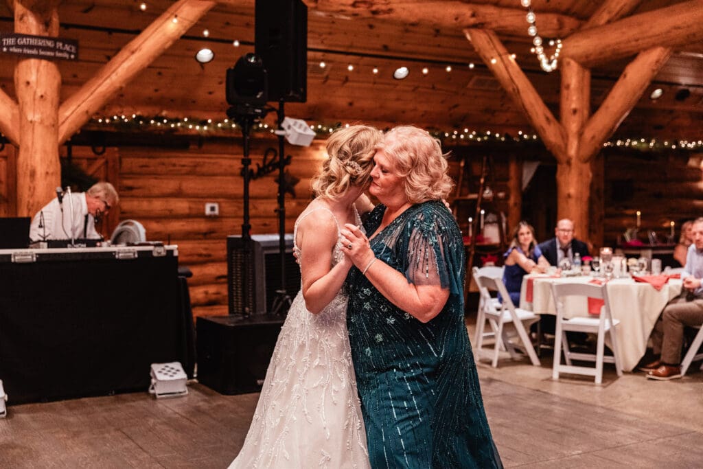 Bride dancing with her mother during reception at The Gathering Place at Darlington Lake