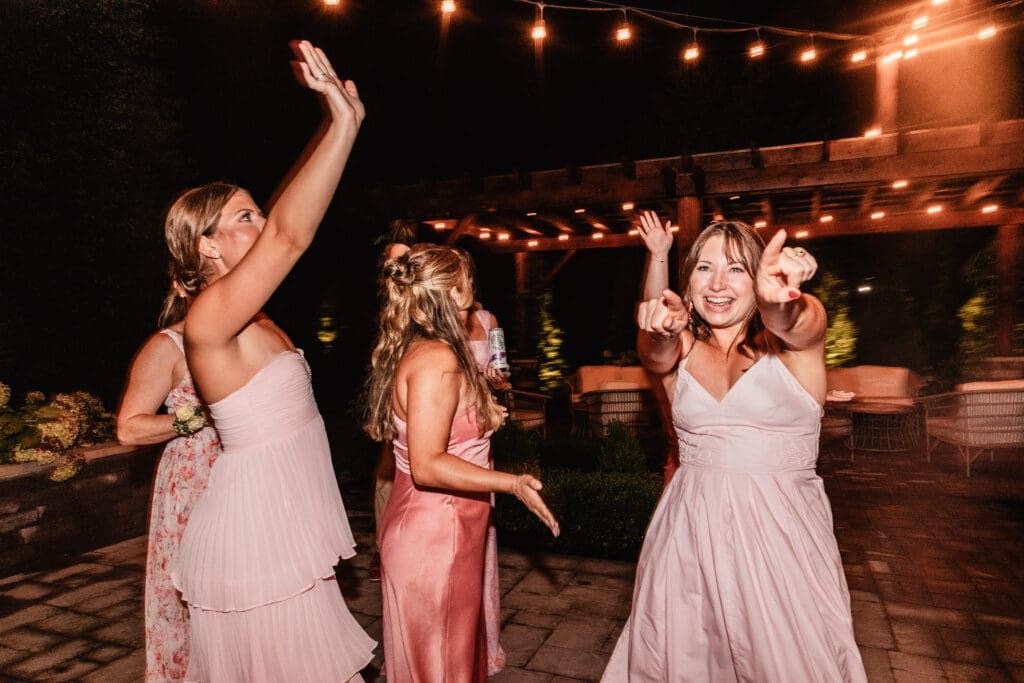 Guests celebrate and dance together during a Willowbrook wedding reception in Volant, PA