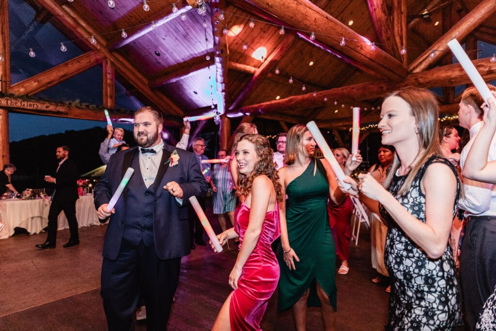 Friends and family dancing during The Gathering Place at Darlington Lake wedding reception