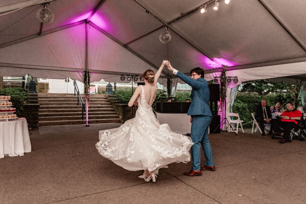 Bride and groom sharing their first dance at a Phipps Botanical Gardens wedding reception in Pittsburgh