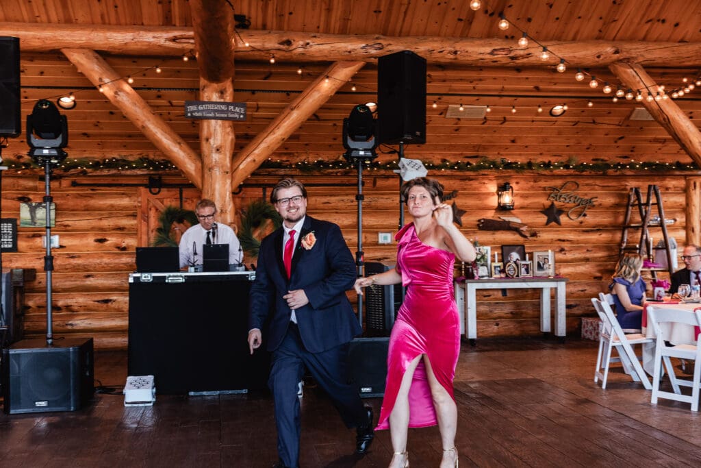 Bridal party celebrating during reception entrance at The Gathering Place at Darlington Lake