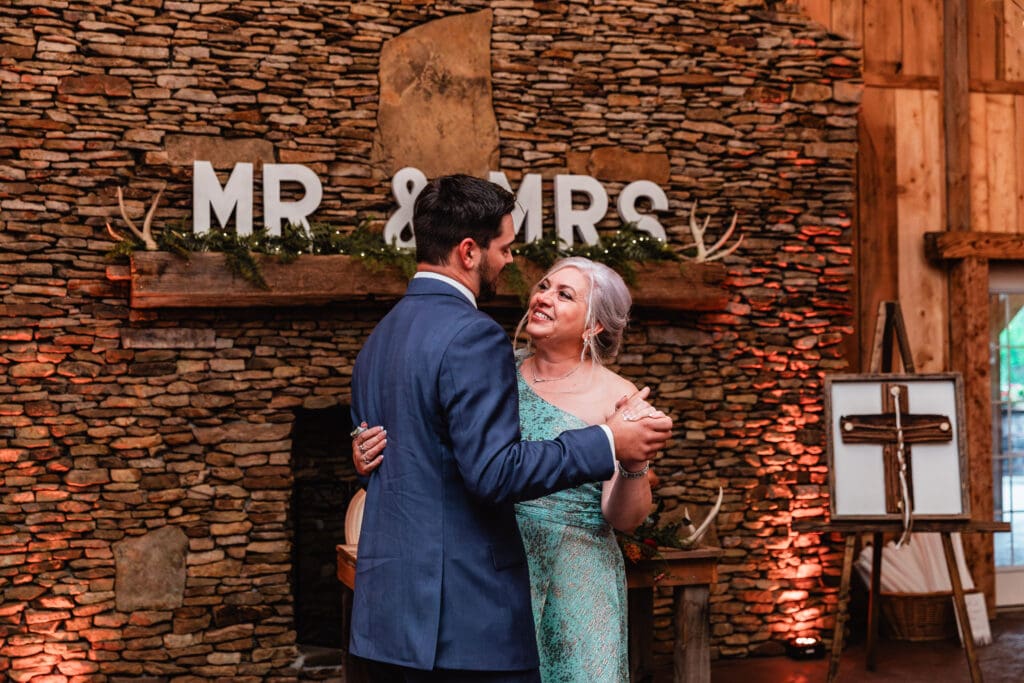 Mother and son share a heartfelt dance at Hinckston Run Farm