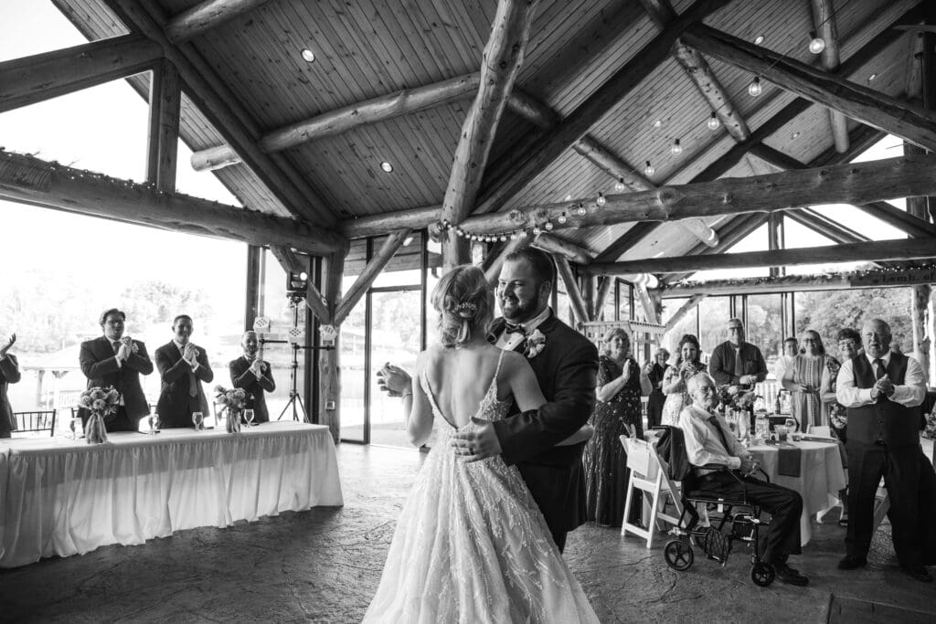 Bride and groom sharing their first dance at The Gathering Place at Darlington Lake reception