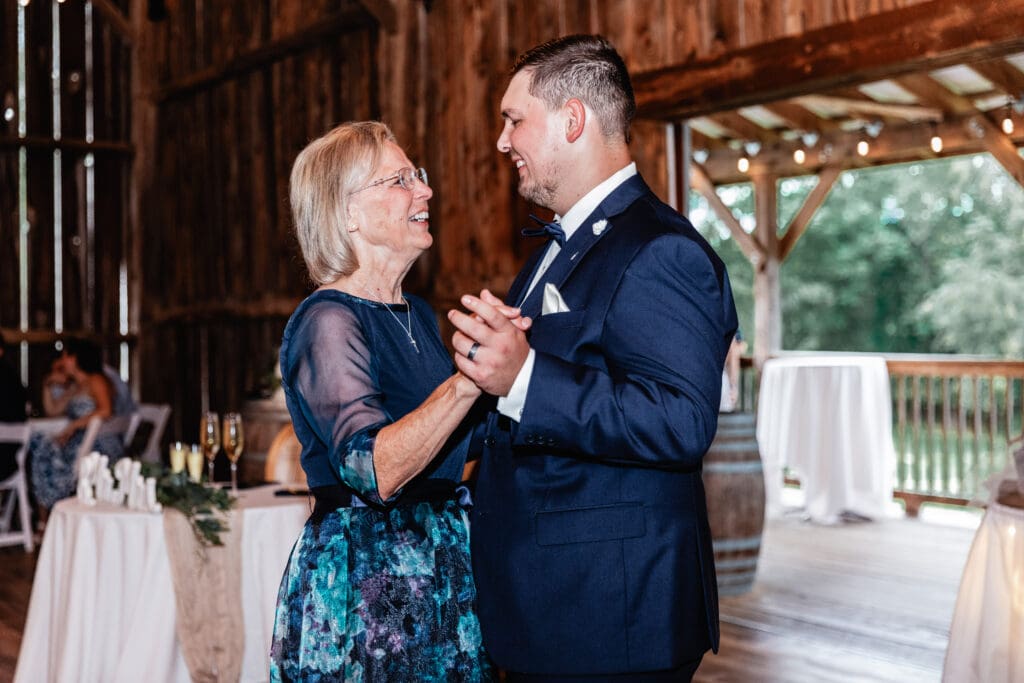 Groom dancing with his mother during the wedding reception at The Barn at Ever Thine in Fenelton, Pennsylvania