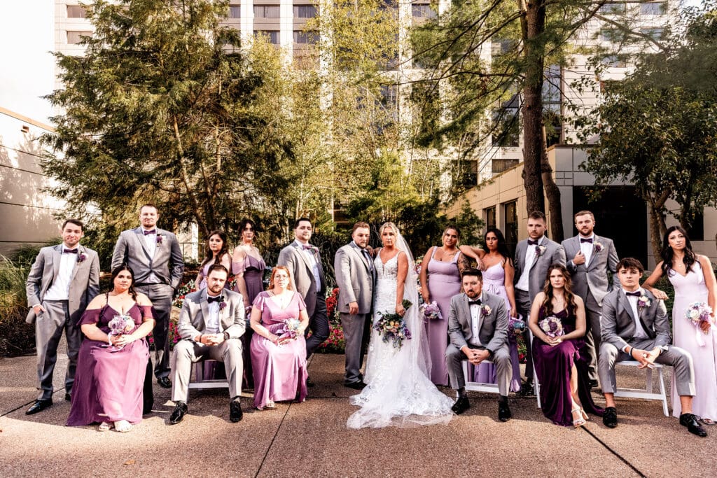 Wedding party posing together at Pittsburgh Airport Marriott wedding