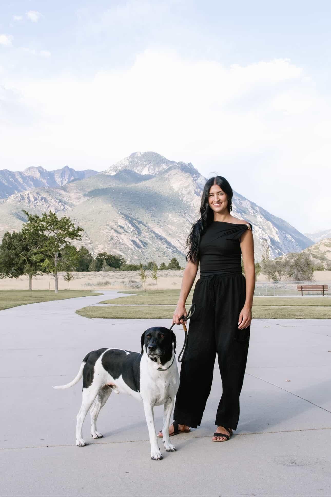 Professional portrait of a Utah dog wedding attendant from Walks of Love who partners with a Utah elopement photographer to help couples include their dogs during Moab elopements with stress-free pet care.